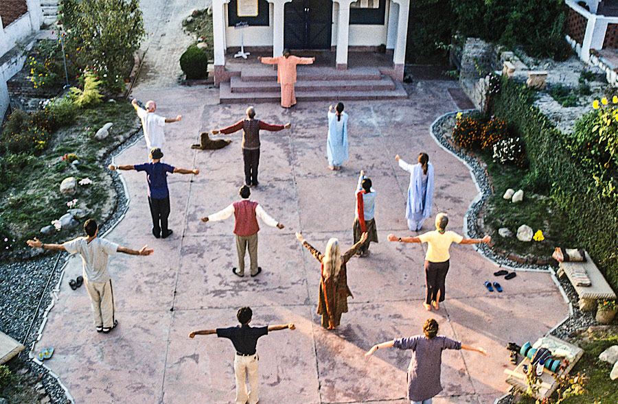 Group energization before meditation at the Dwarahut Ashram.